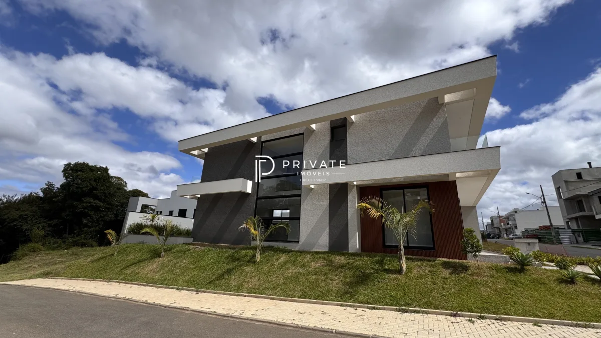 Casa contemporânea com arquitetura autoral e vista privilegiada | Santa Felicidade