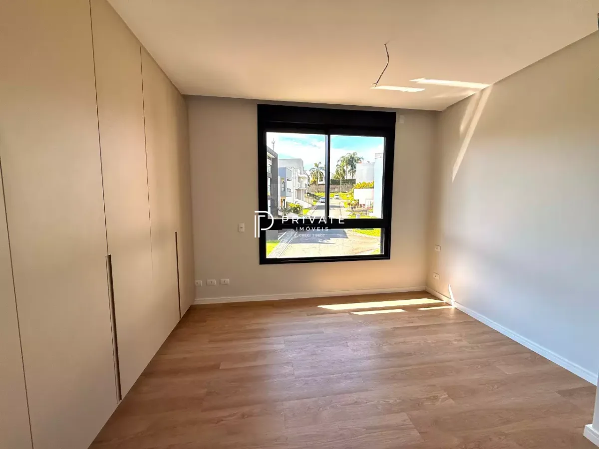 Casa contemporânea com arquitetura autoral, jardim privativo e 3 suítes