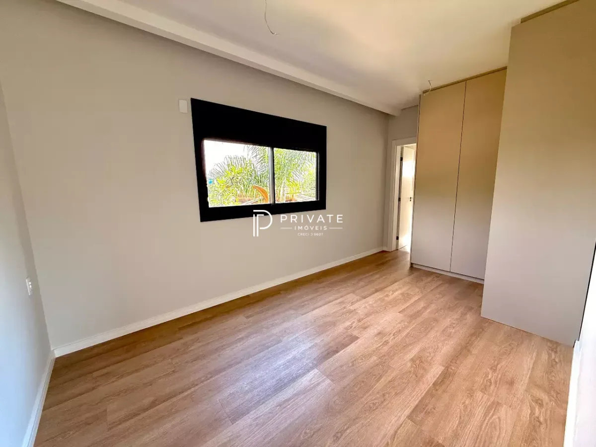 Casa contemporânea com arquitetura autoral, jardim privativo e 3 suítes